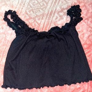 From tjmaxx size xs, black cropped tee. Selling for $5.00. Great condition.